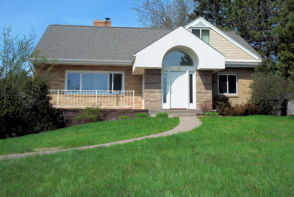 Exterior view of a well-maintained residence from our homes and residences offerings